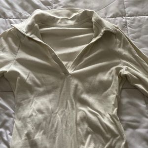 Long sleeve rubbed body suit